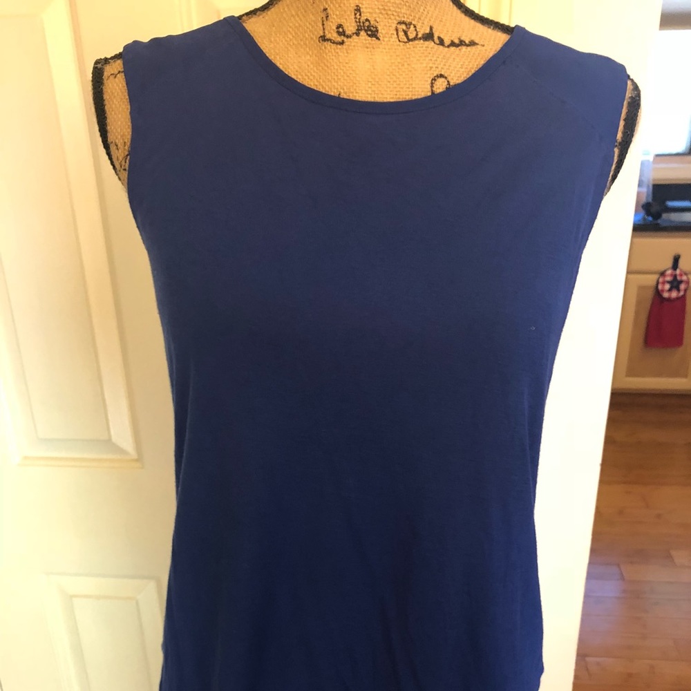 Like new! Cobalt blue sleeveless shirt, size M.